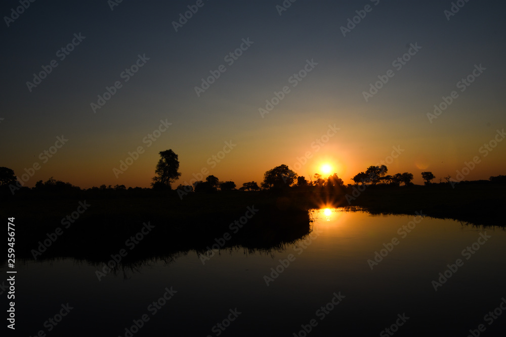 Sun down on the Okavango Delta Sun down on the Okavango Delta