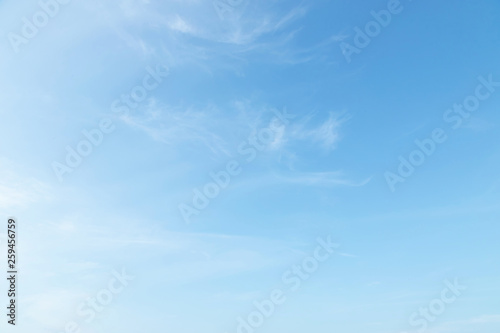 Canvas Print Beautiful clear blue sky background with tiny plain white cloud on morning time rays sunlight