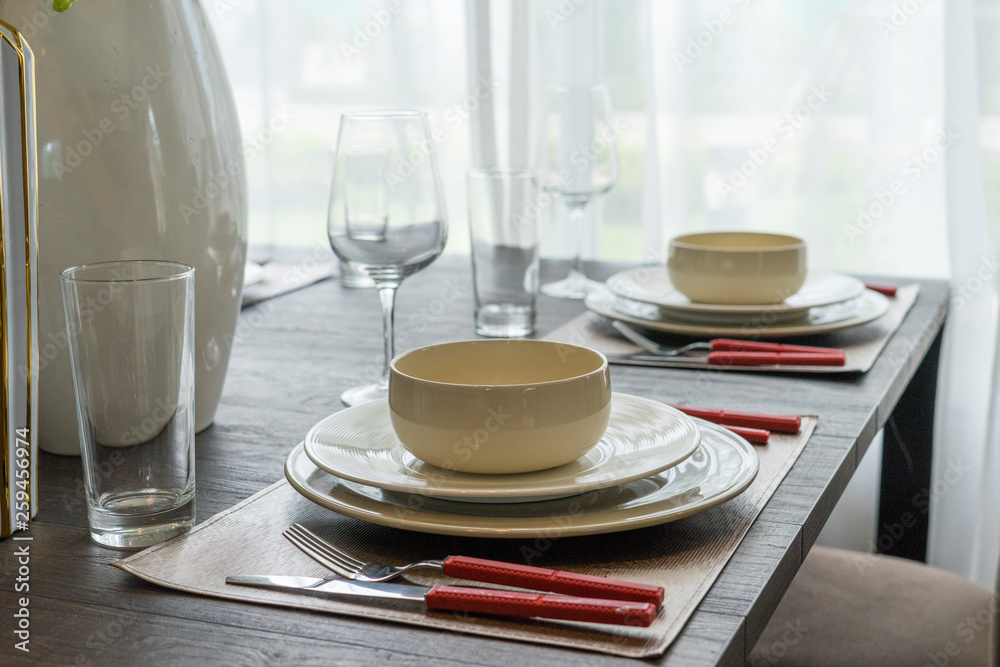 luxury plate setting on dinning table