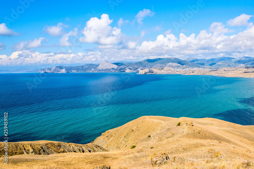 View of the blue sea bay and cloudy sky