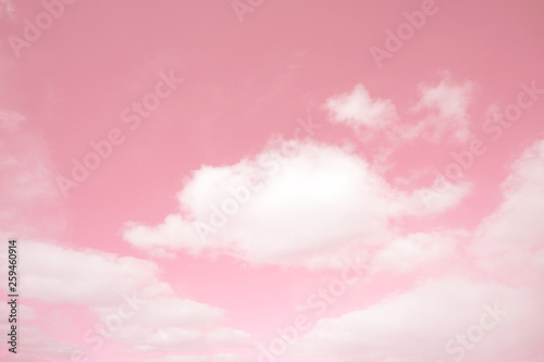 Abstract unreal pink sky and cumulus clouds