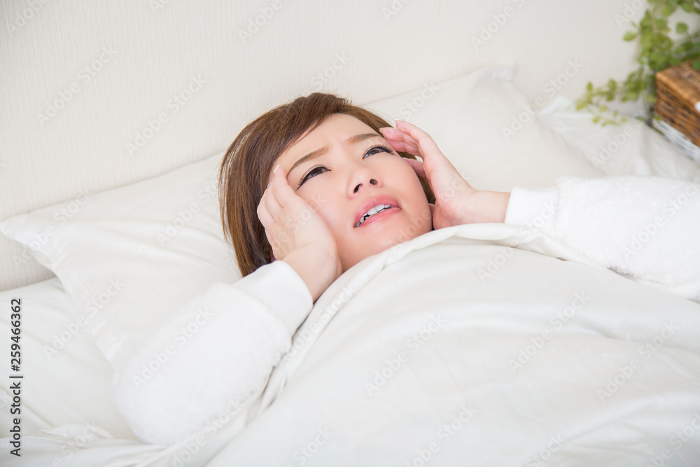 就寝時に体調不良になった女性 就寝時に体調不良になった女性