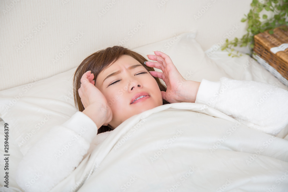 就寝時に体調不良になった女性 就寝時に体調不良になった女性