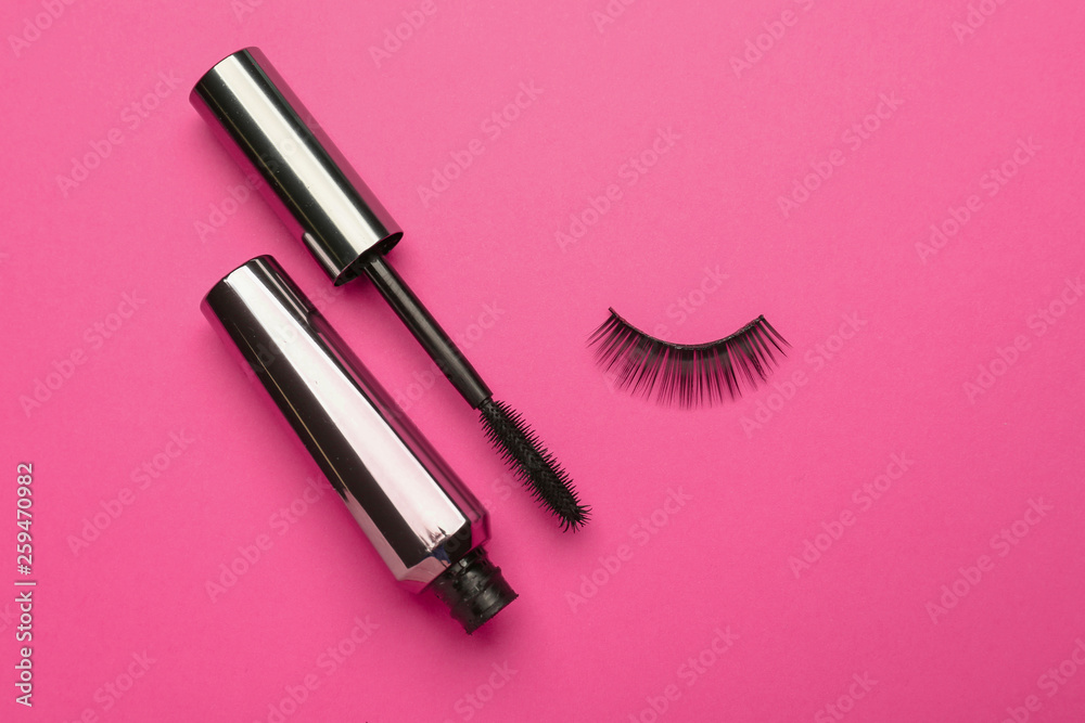 Mascara with false eyelashes on color background Mascara with false eyelashes on color background