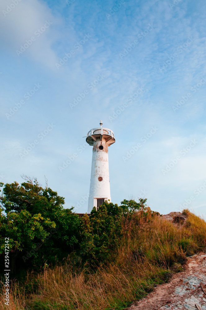 Lighthouse and rock at Laem Tanod Cape Koh Lanta, Krabi, Thailand