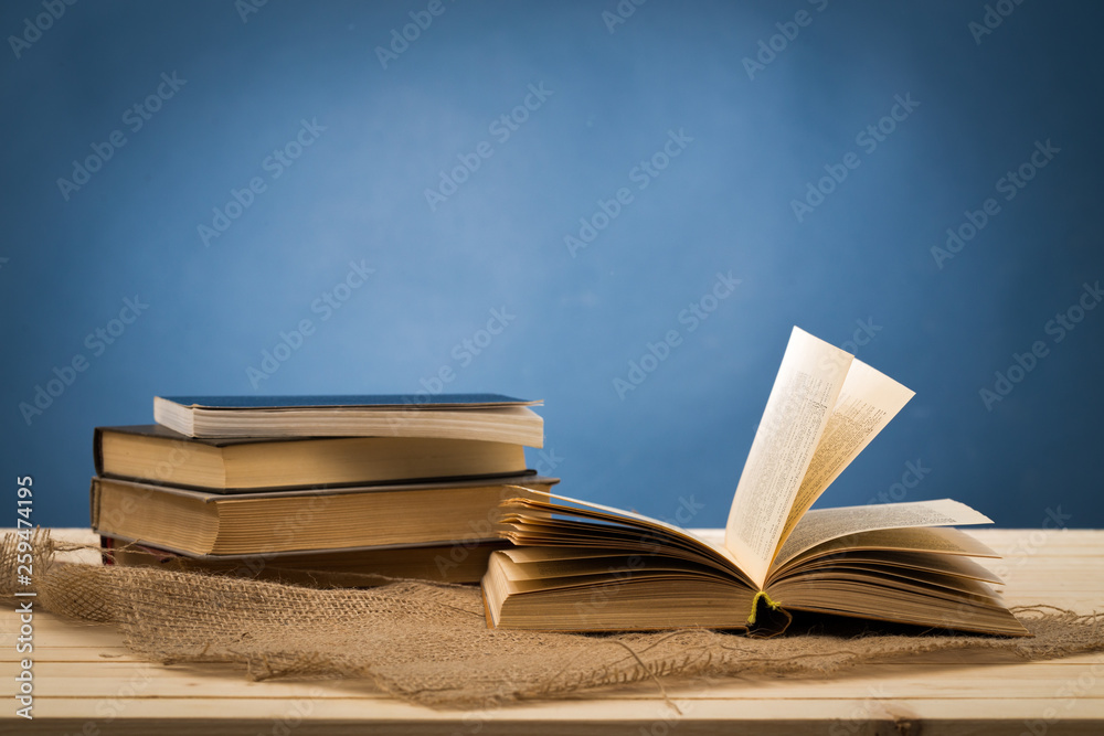 Naklejka premium Stack of books on the table