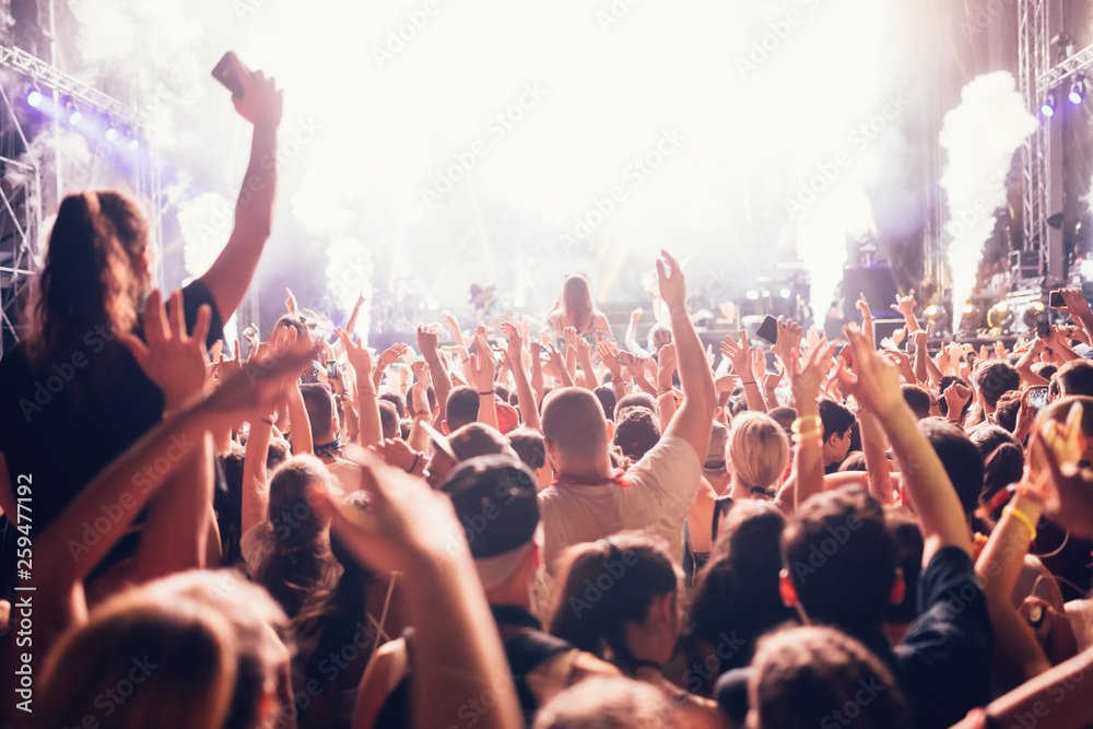 Portrait of happy crowd enjoying at music festival Portrait of happy crowd enjoying at music festival
