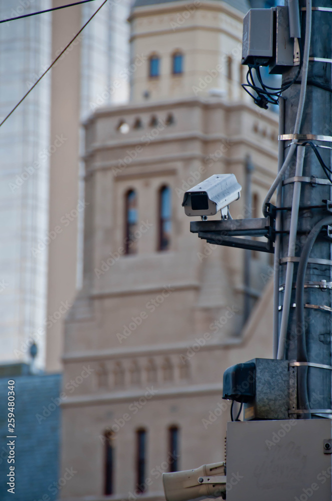 Surveillance CCTV street outdoor camera watching pedestrian near Surveillance CCTV street outdoor camera watching pedestrian near