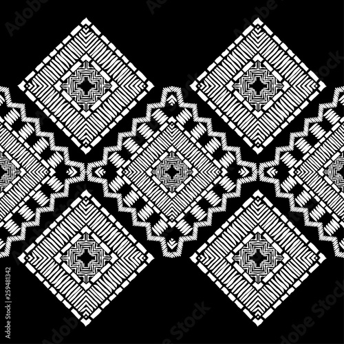 Ethnic boho seamless pattern. Embroidery on fabric. Patchwork texture. Weaving. Traditional ornament. Tribal pattern. Folk motif. Can be used for wallpaper, textile, invitation card, wrapping, web pag