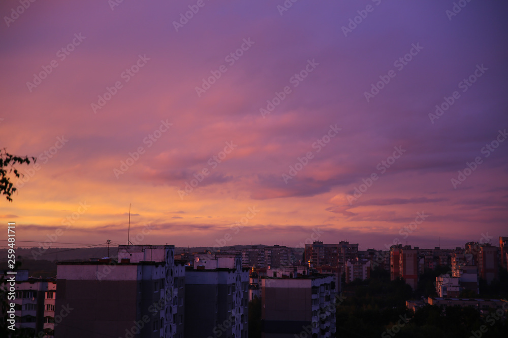 Beautiful sunset over the city. Purple sky colours.