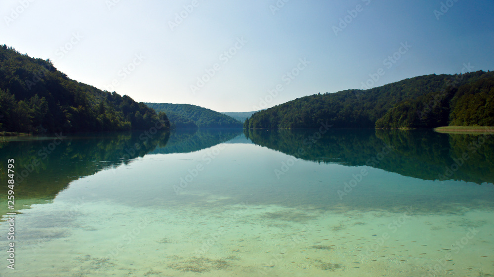 Crystal water and landscape with hills, Plitvice Lakes in Croatia, National Park