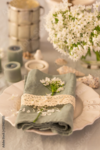 Spring or summer table setting in coastal style.