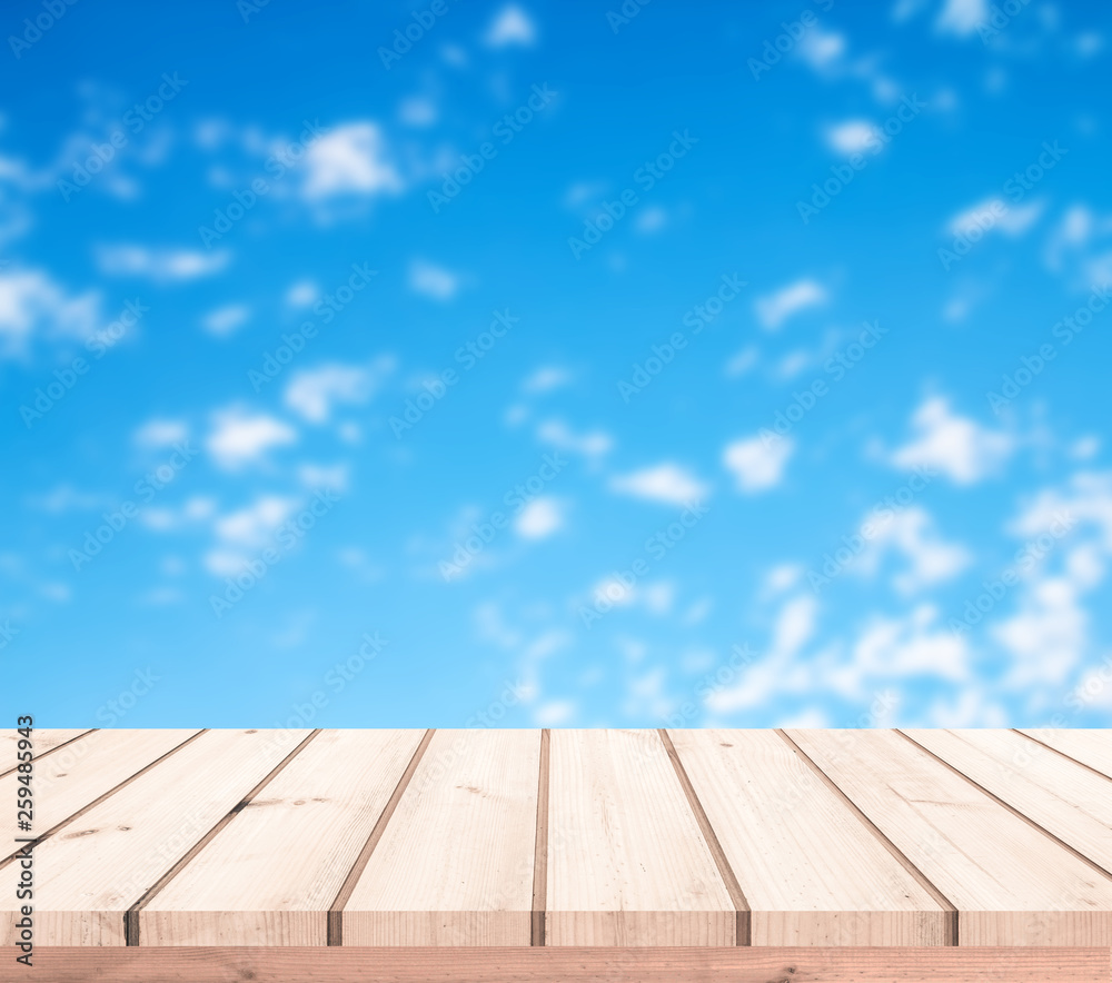 wood floor or wood table with cloud and blue sky for product display