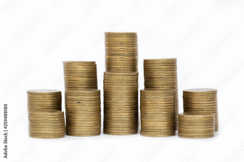 Close up of coins to stack of coins, Business Growth concept, There is money coins to stack of coins. White background Close up of coins to stack of coins, Business Growth concept, There is money coins to stack of coins. White background