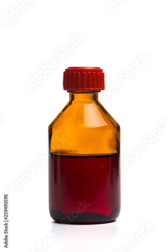 Medical glass bottle on a white background