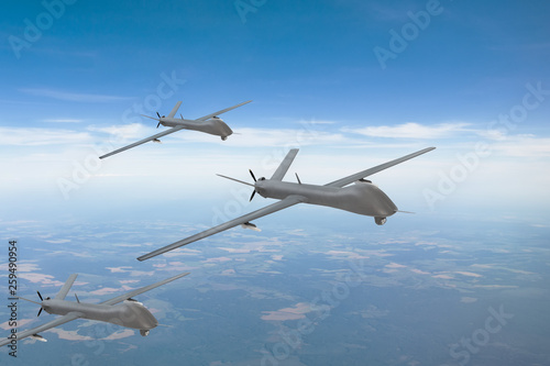 The group of unmanned aerial vehicles in the sky over the territory of patrol.