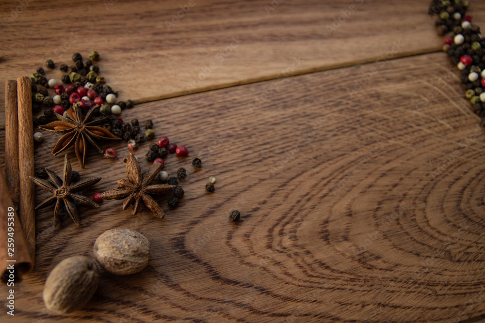 Spices on wooden background. For poster, card, banner, flyer, menu. Spices on wooden background. For poster, card, banner, flyer, menu.