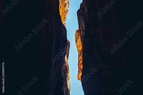 Rocky walls of so called Siq passage in ancient Petra city in Jordan