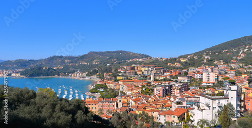 Panoramic landscape with sea coast in golf of Poeti with boats, roofs and old buildings in Lerici, La Spezia Liguria, Italy