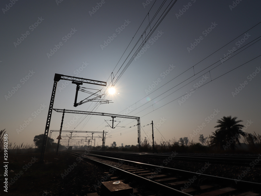 Railroad track silhouette perspective view.
