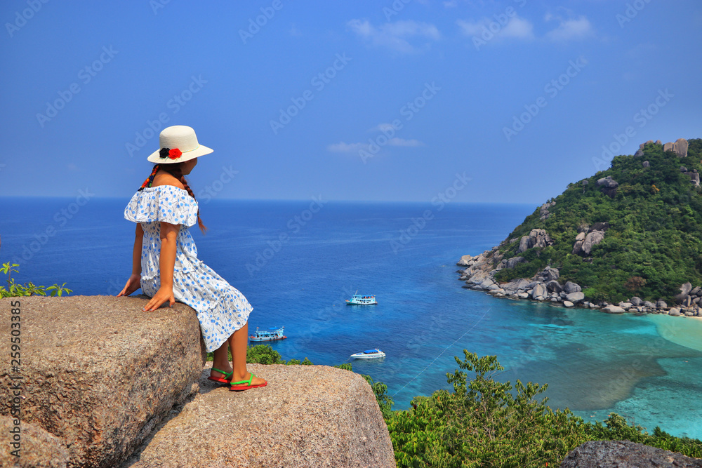 March 17, 2019, Koh Nang Yuan View Point In Surat Thani Province Of Thailand, female tourists watching the beautiful sea view of the island