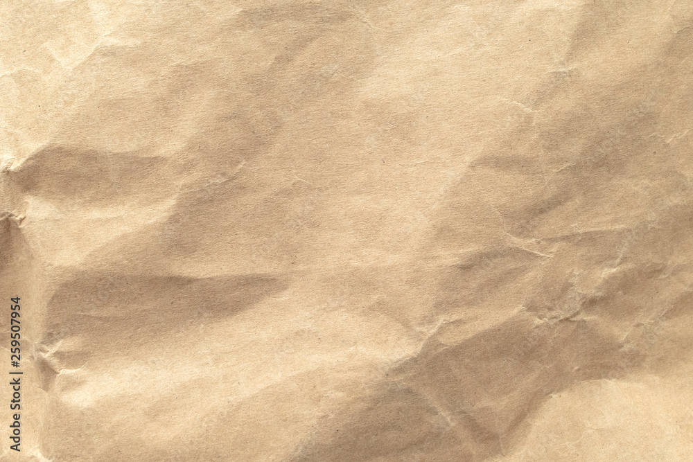 Brown crumpled paper texture background. Brown crumpled paper texture background.