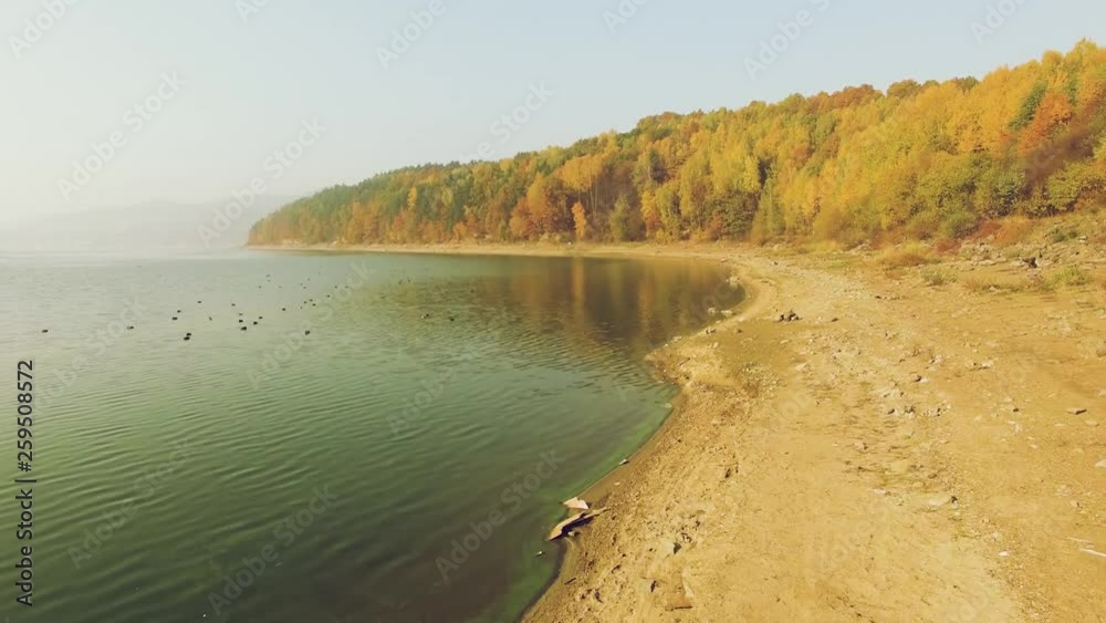 Aerial view of a lake area during fall. Aerial view of a lake area during fall.