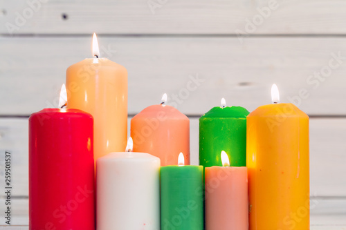 home lighting candles on wooden table