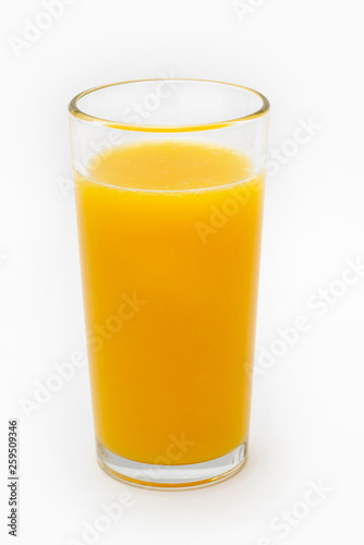 a glass of orange juice on a white background