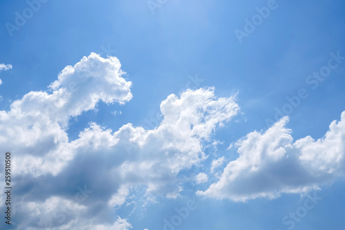 Bright blue sky with fluffy white clouds, Blue sky with white clouds.