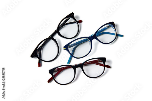 three of dark eyeglasses photo