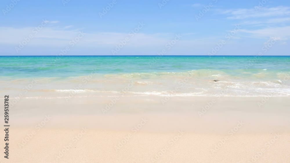 simple tropical beach, sea and sky view, waves gently rolling up the beach simple tropical beach, sea and sky view, waves gently rolling up the beach