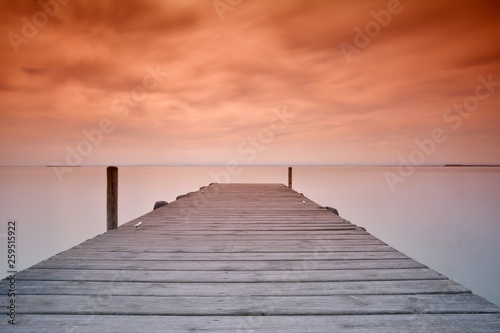 Wooden pier at sunset
