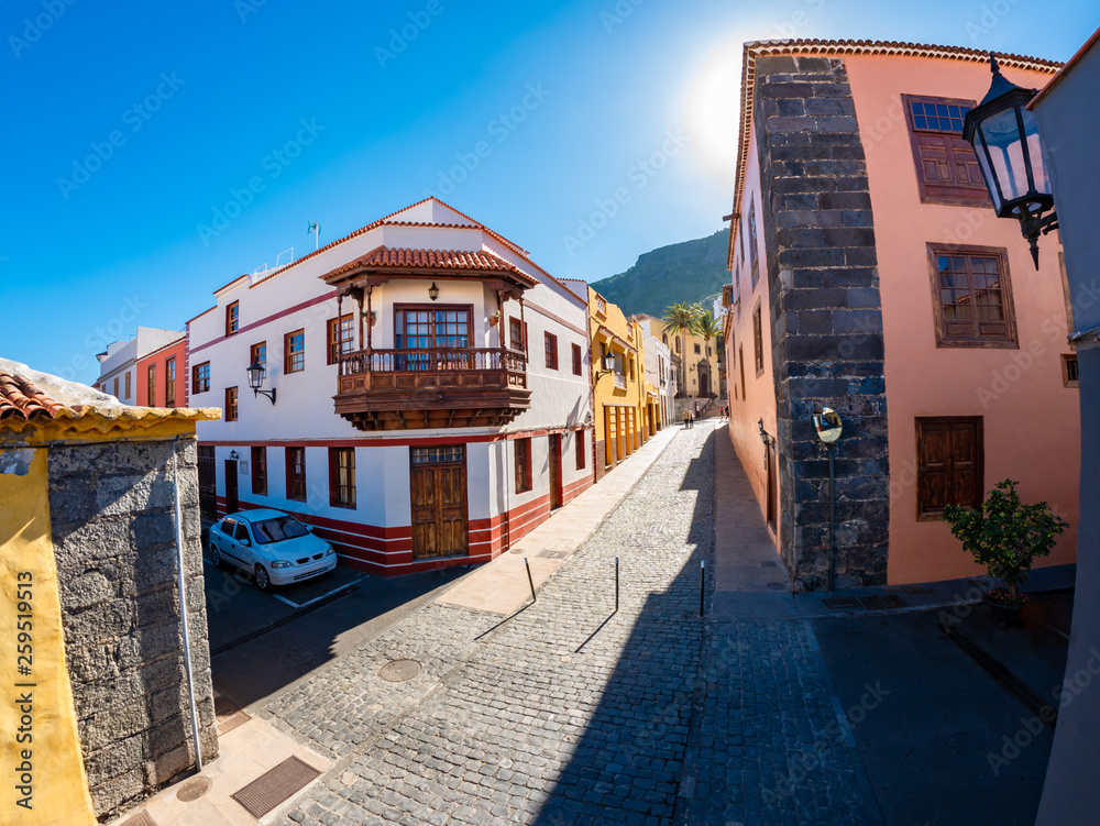 Traditional house architecture and narrow street in Garachico town of Tenerife island - Spain