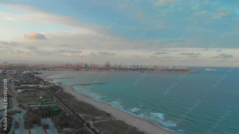 Aerial view of the port of Valencia at sunset seen from El Saler beach. Valencia. Spain Aerial view of the port of Valencia at sunset seen from El Saler beach. Valencia. Spain