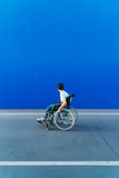 Portrait of young man on wheelchair