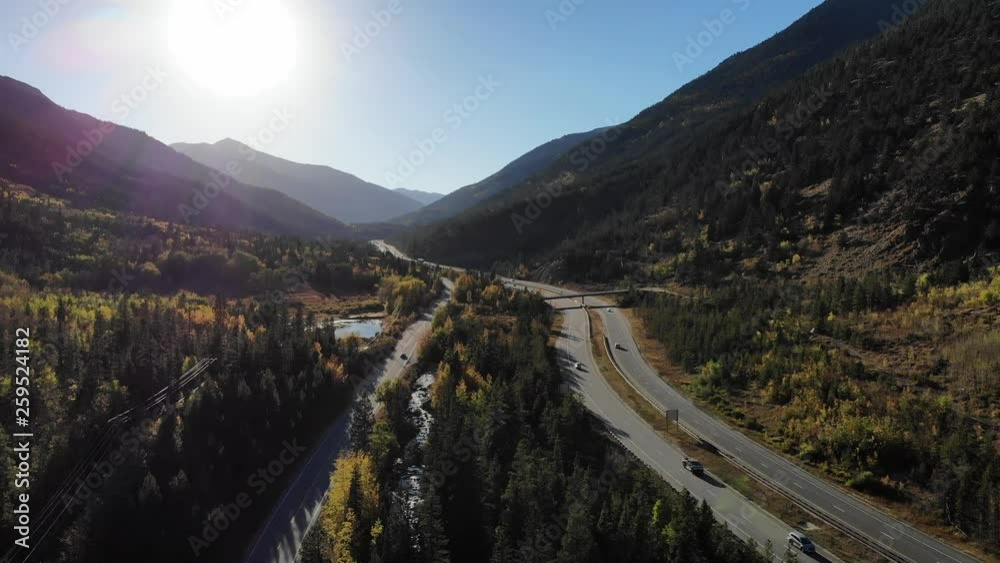 A flight over a mountainous highway