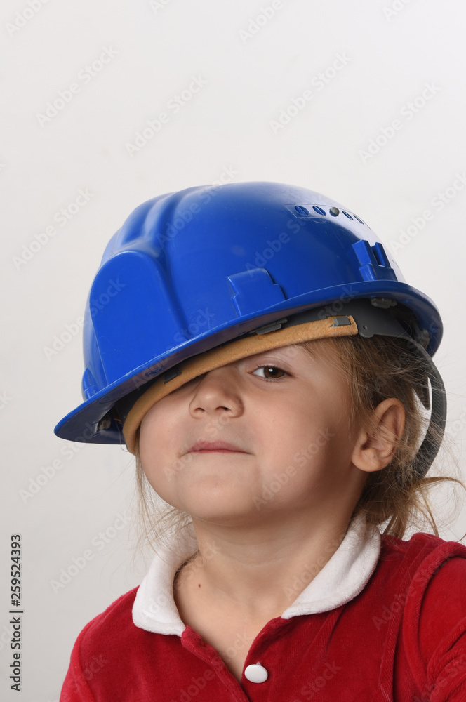 child with a construction helmet child with a construction helmet