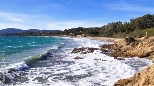 Mistral wind storm on Gigaro beach with waves crashing on reefs. Cap Lardier, La Croix Valmer, France photo