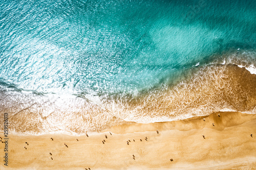 Aerial photo of summer beach and blue ocean with sky. 