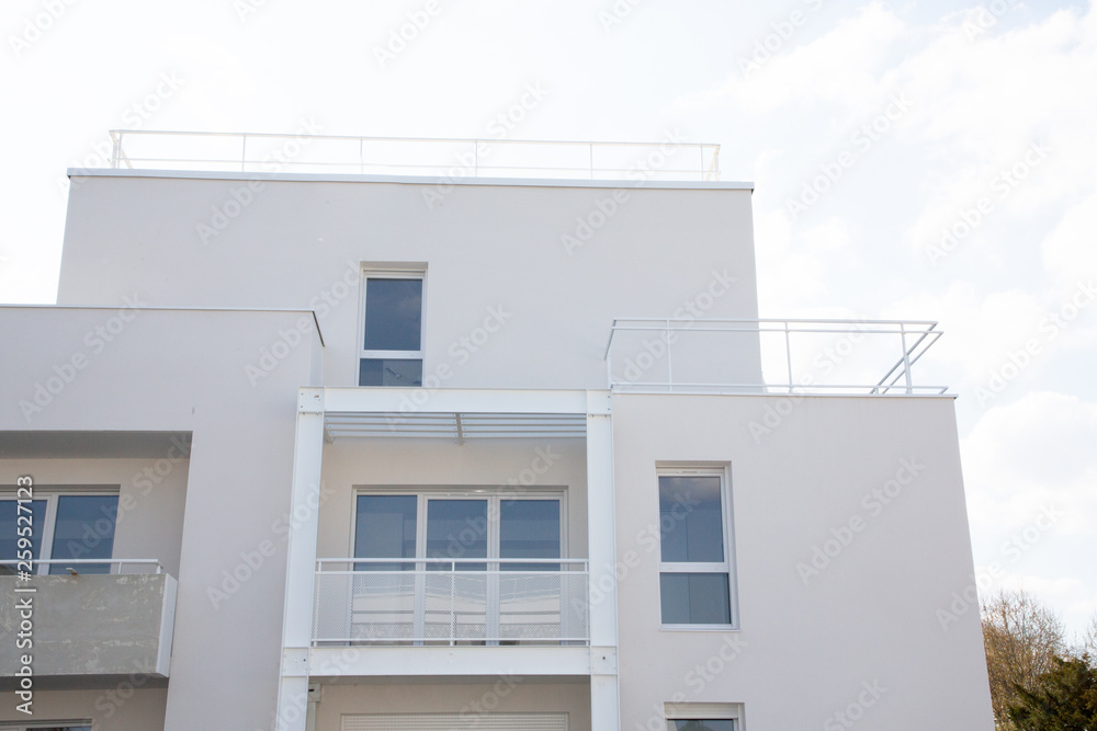 Detail of a new modern white apartment building Detail of a new modern white apartment building