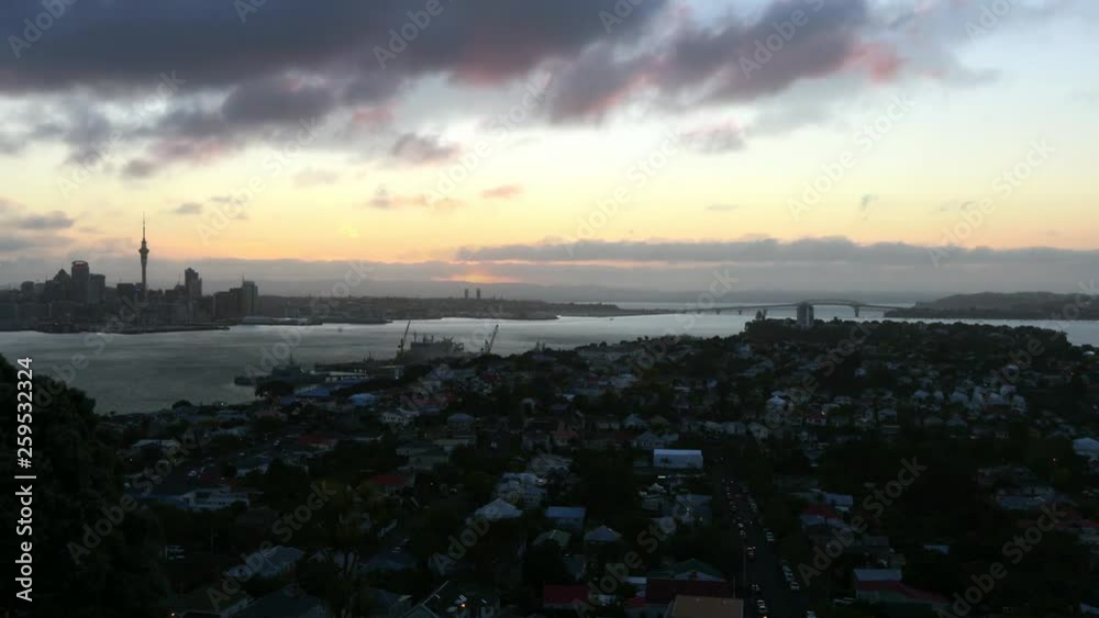 Timelapse of sunset in Auckland City, view from North Point, New Zealand Timelapse of sunset in Auckland City, view from North Point, New Zealand