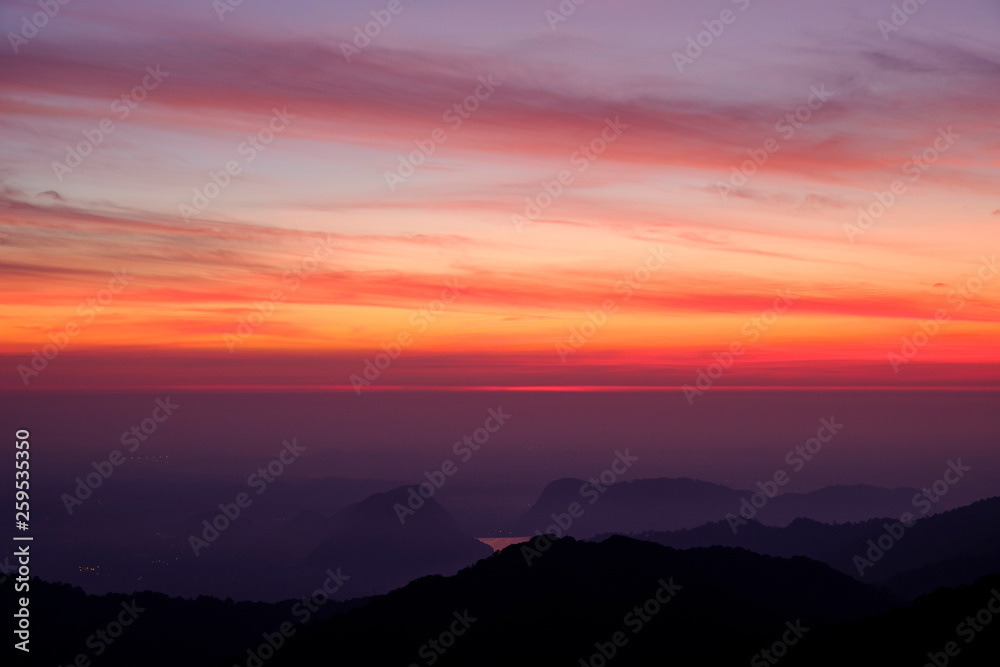 Twilight light pink and purple colors beautifully. reflect the views Mountains and fog in the morning. Khao Jed Yod, Trang in Thailand. Twilight light pink and purple colors beautifully. reflect the views Mountains and fog in the morning. Khao Jed Yod, Trang in Thailand.