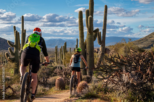 Mountain Bikers On Desert Trail In Scottsdale, Arizona photo