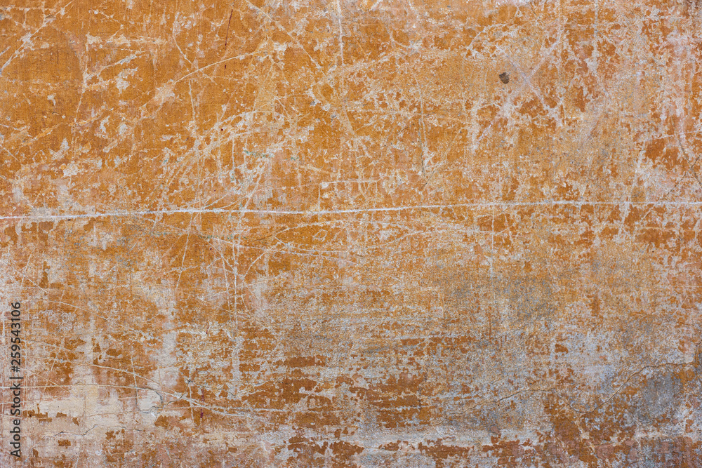 texture of old orange paint on concrete wall