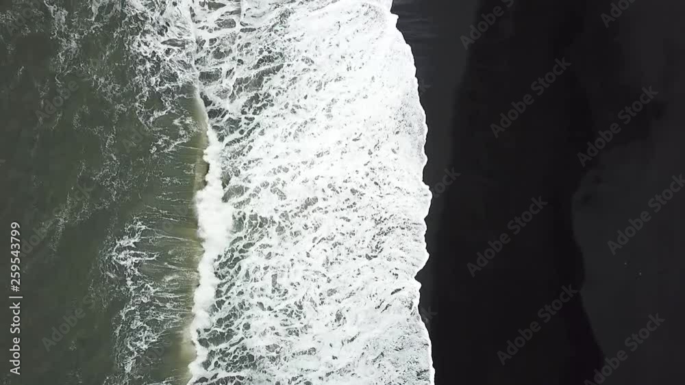 A slo motion video of Icelands Reynisfjara Beach waves crashing on the shore. A slo motion video of Icelands Reynisfjara Beach waves crashing on the shore.