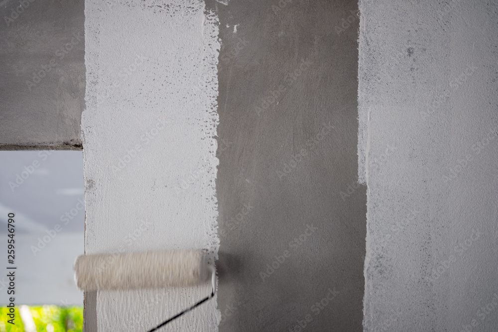 Painting color on building wall. Apartment renovation. Painting color on building wall. Apartment renovation.