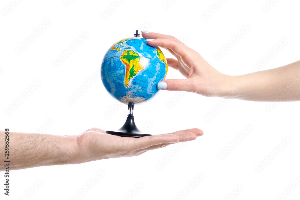 Two hands holding globe on white ackground isolation Two hands holding globe on white ackground isolation
