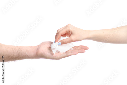 Hand give wet wipe to hand on white background isolation