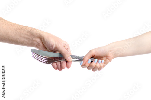 Hand give fork and knife to hand on white background isolation